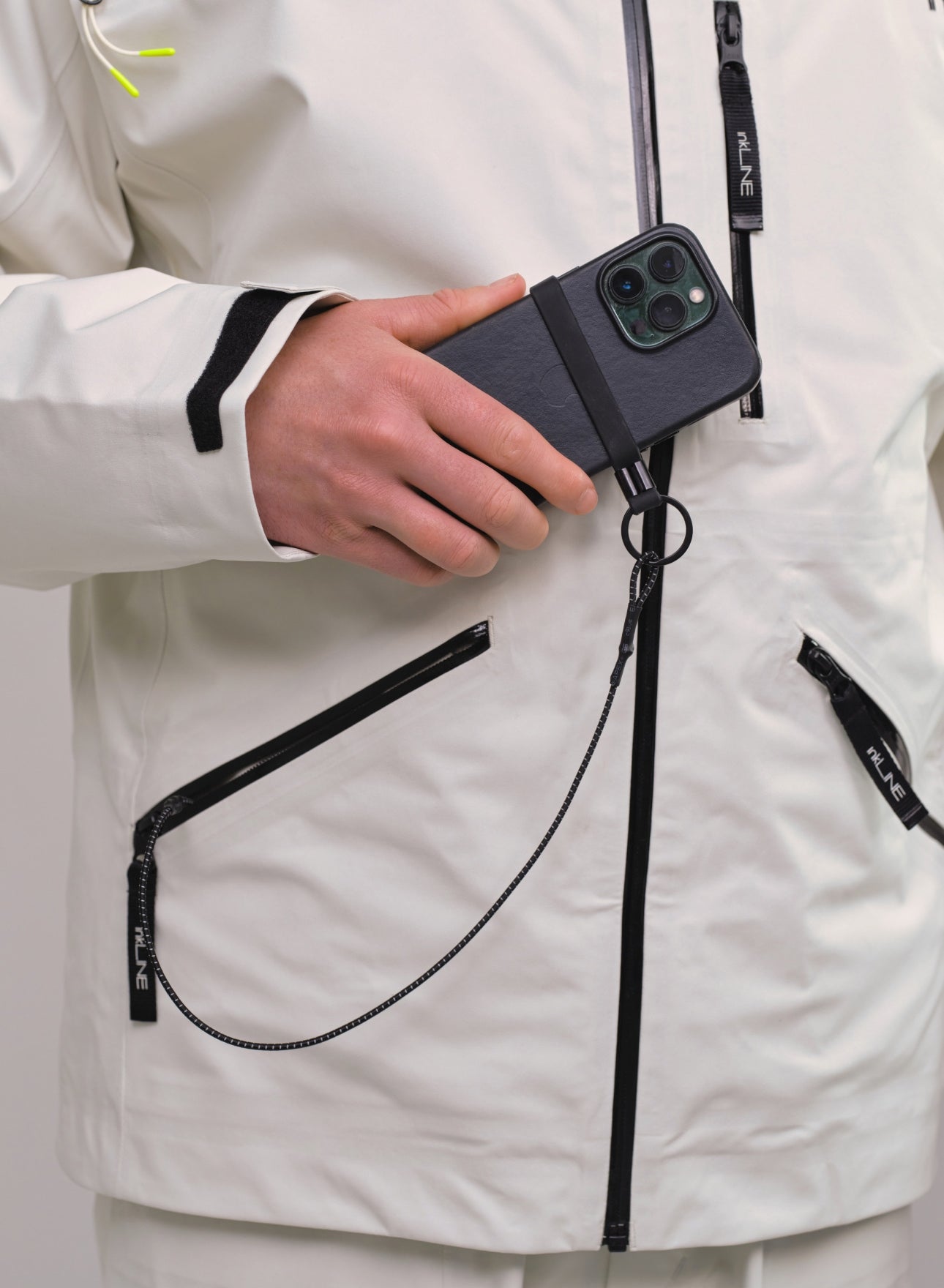 mens cream ski jacket with phone leash- InkLine