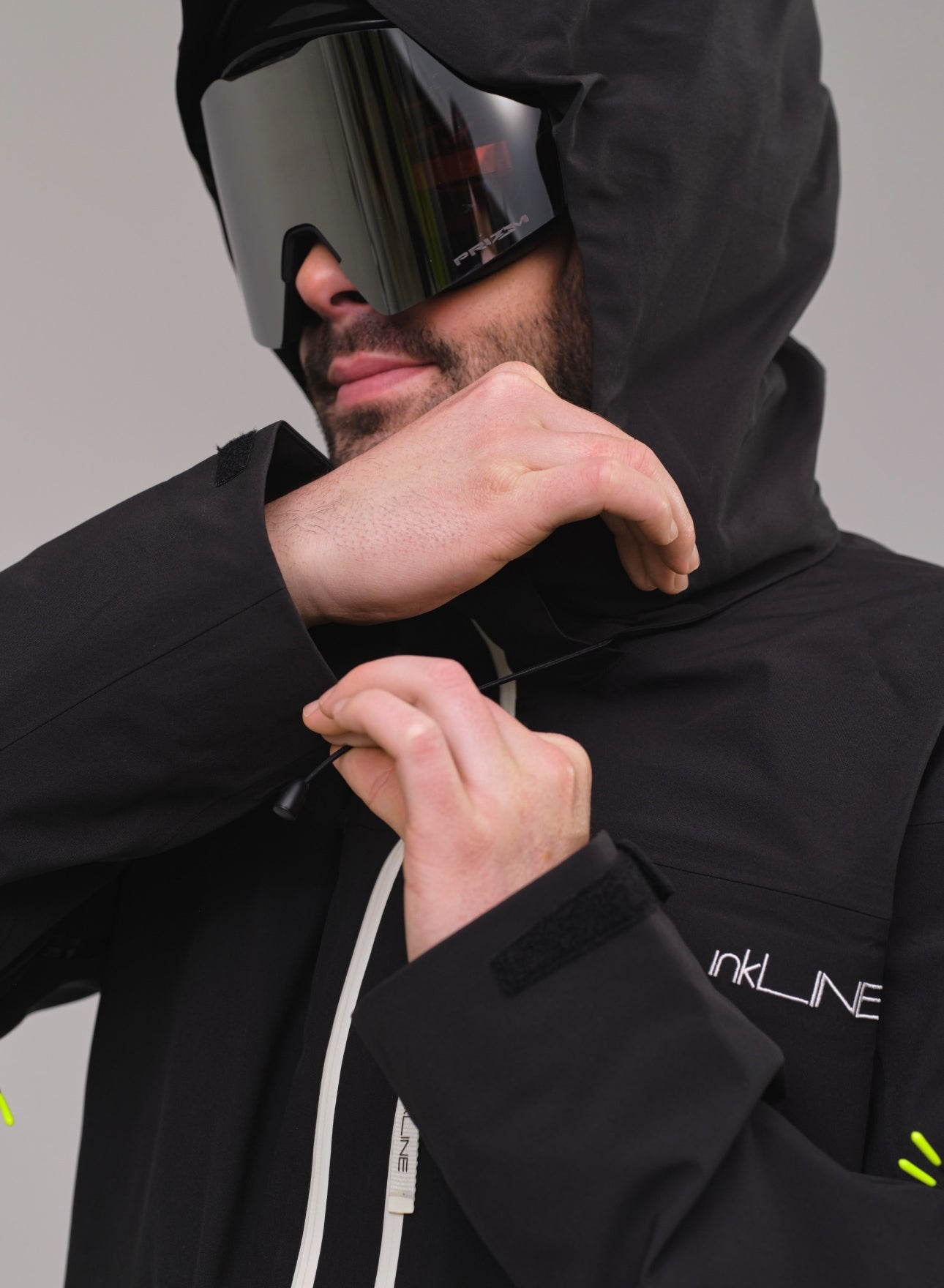 mens black snowboard jacket with adjustable hood- InkLine