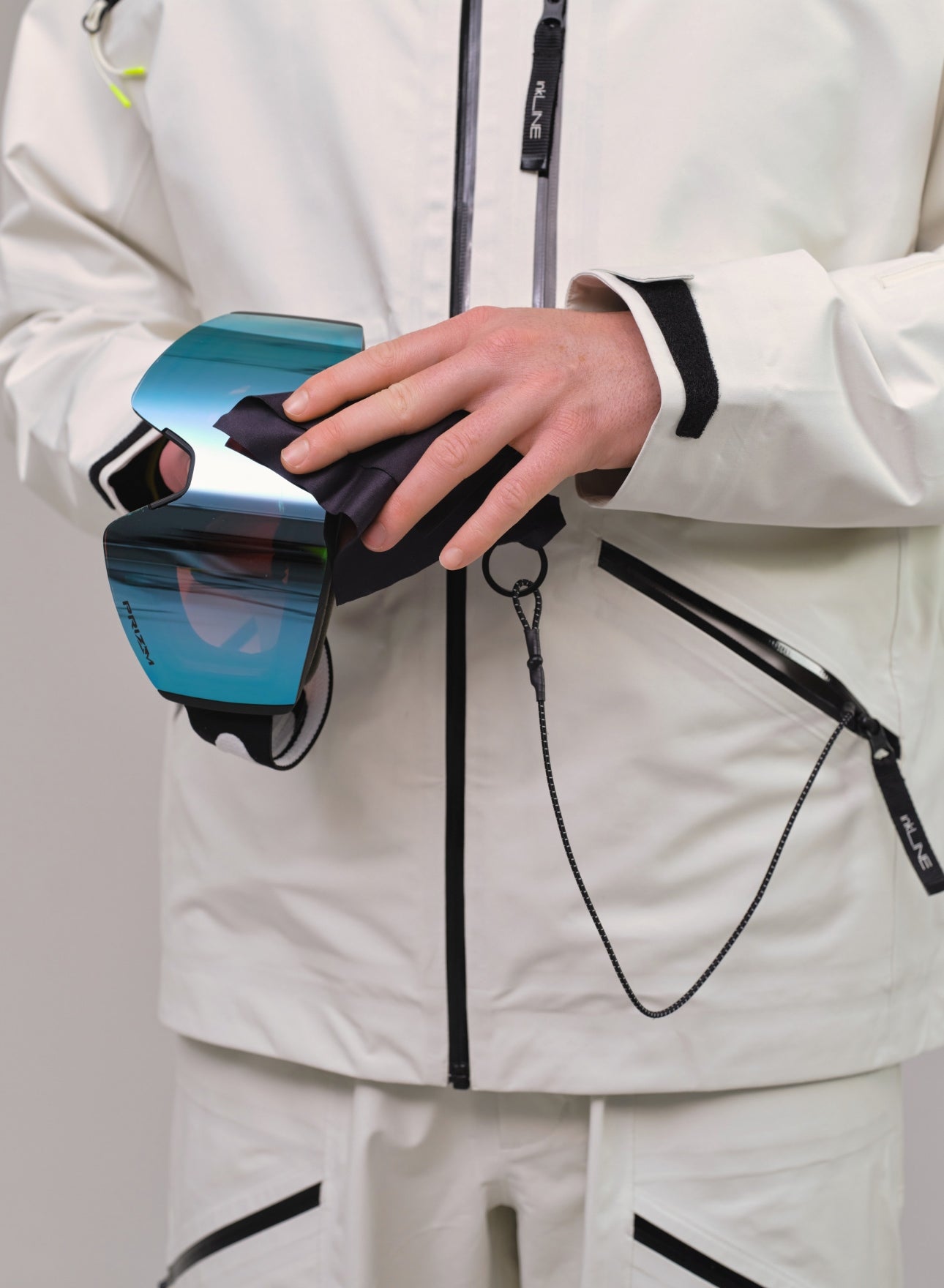 mens cream ski jacket with goggle wipe - InkLine