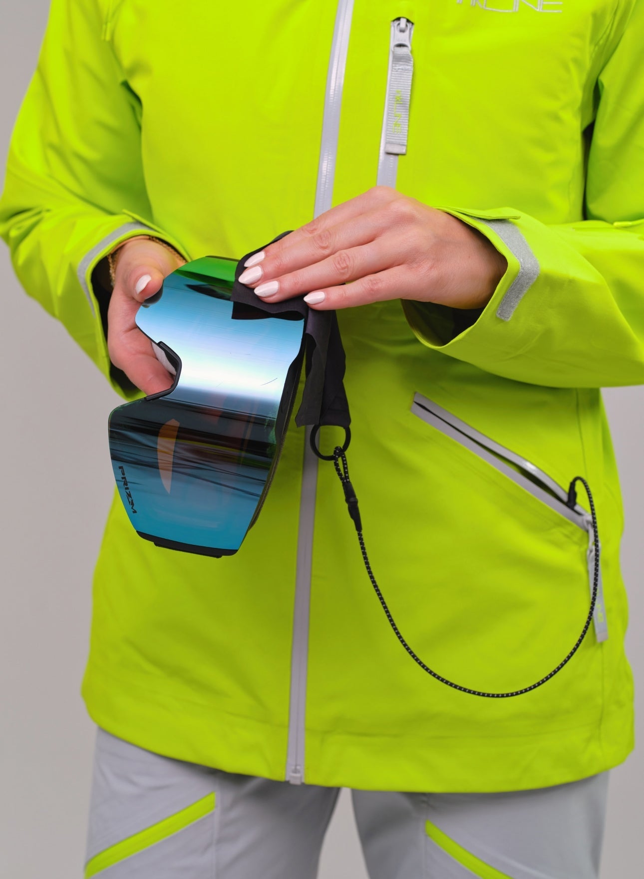 womens lime green ski and snowboard jacket with goggle wipe