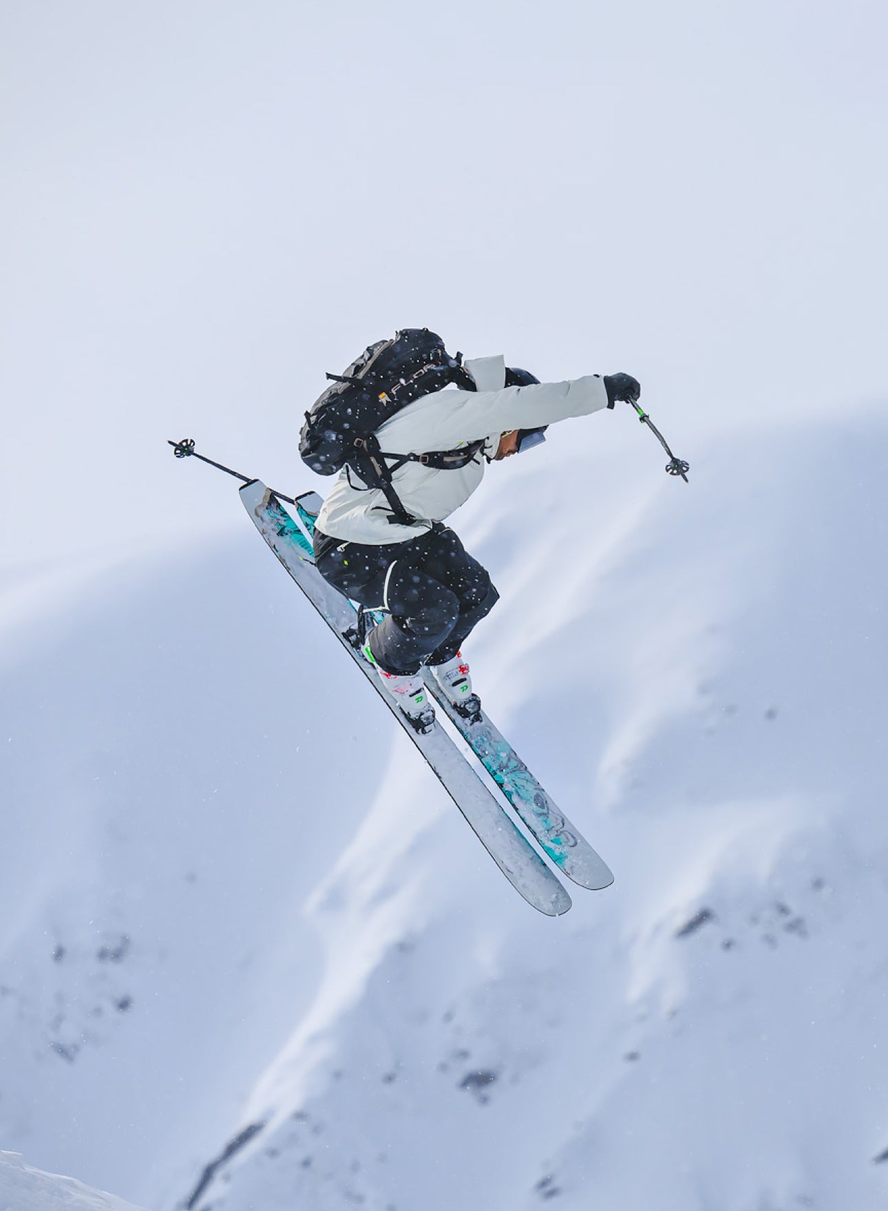 Matching backcountry ski outfit in black and cream